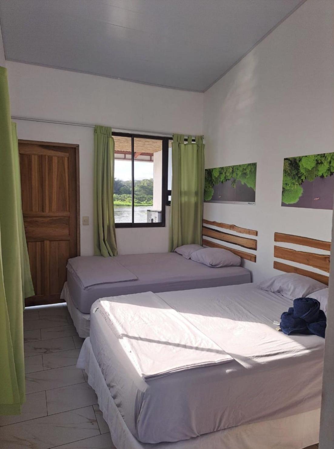 Hotel Pura Natura Riverside Tortuguero Bagian luar foto